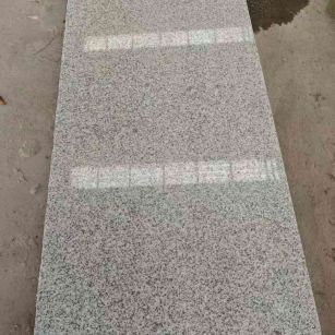 朝阳芝麻白光面毛板